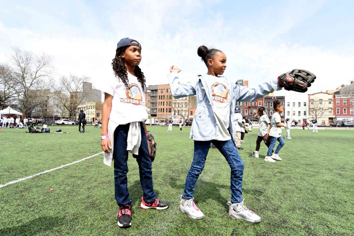 Pitcher perfect: More than 100 kids from public housing enjoy a day of baseball