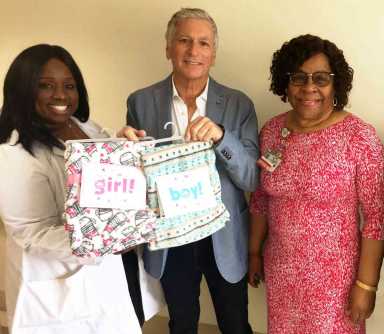 Downtown kids department store gifts blankets to new Kings County moms