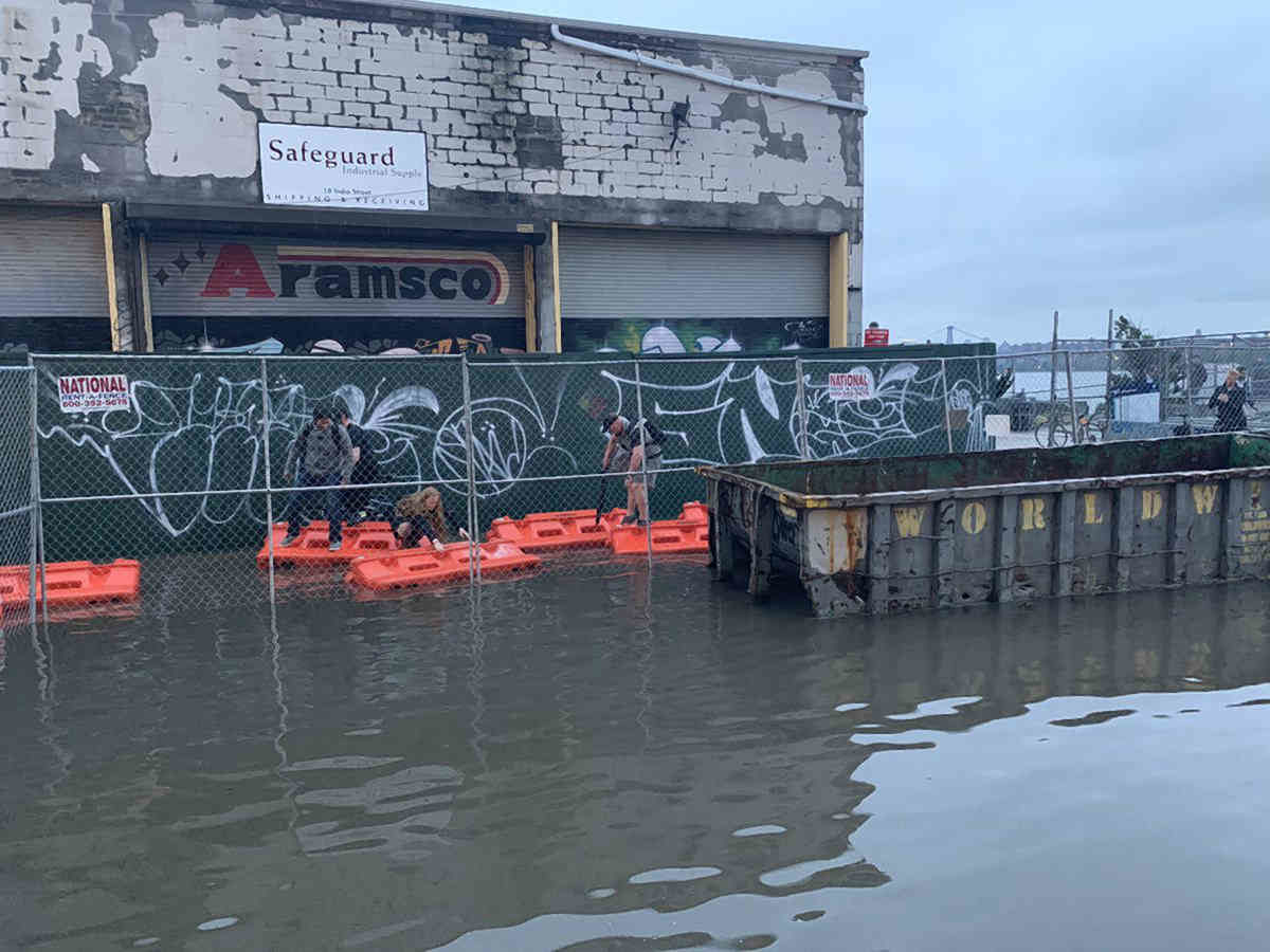 Waterlogged: Greenpoint ferry commuters left stranded by flooded access street