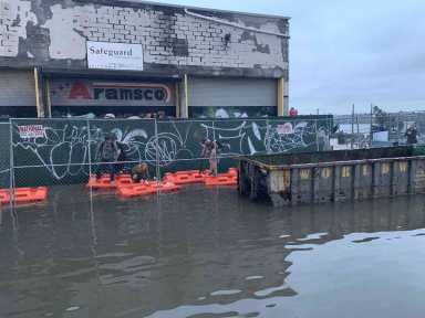 Waterlogged: Greenpoint ferry commuters left stranded by flooded access street
