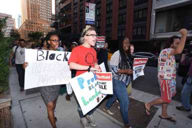 Demonstrators rally to oppose demolition of historic Downtown abolition house