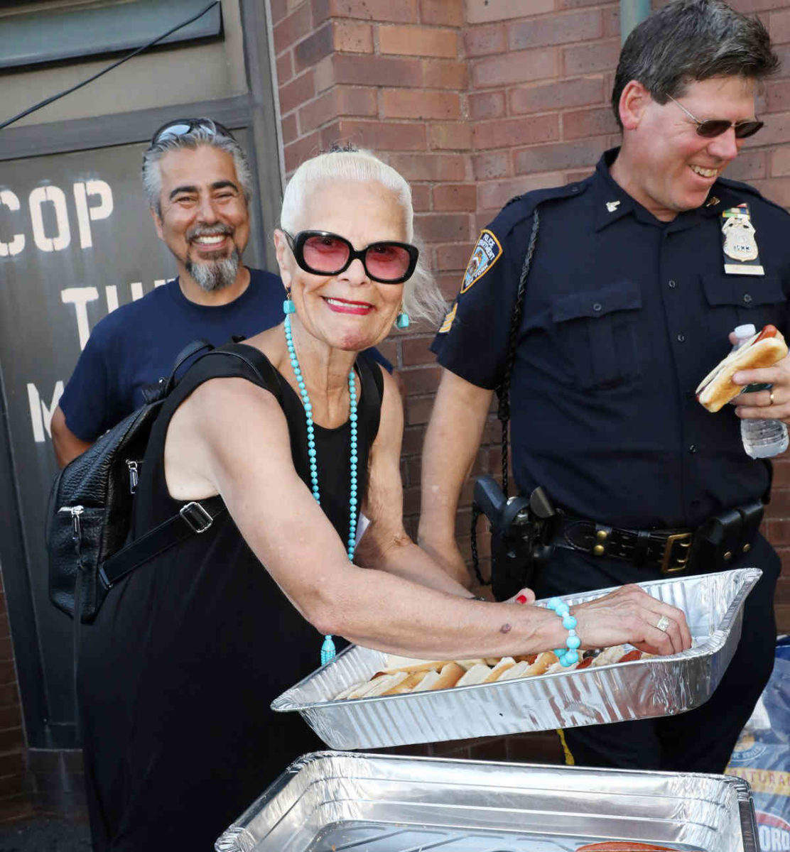 Fun police: Brooklynites join forces with officers at the 61st Precinct for annual Night Out carnival