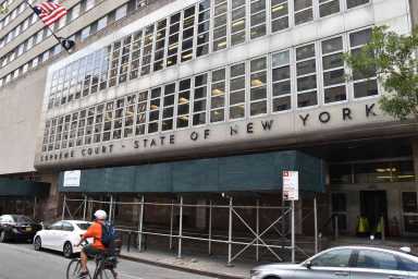 The state Supreme Court Building in Downtown Brooklyn, where they impose court fees on people accused of a crime.