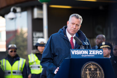 New York City Mayor Bill de Blasio announced that the proposed budget for 2018 would include an unprecedented commitment to Vision Zero improvements in the City. Improvements will include additional NYPD Crossing Guards, lighting, street safety redesign, a