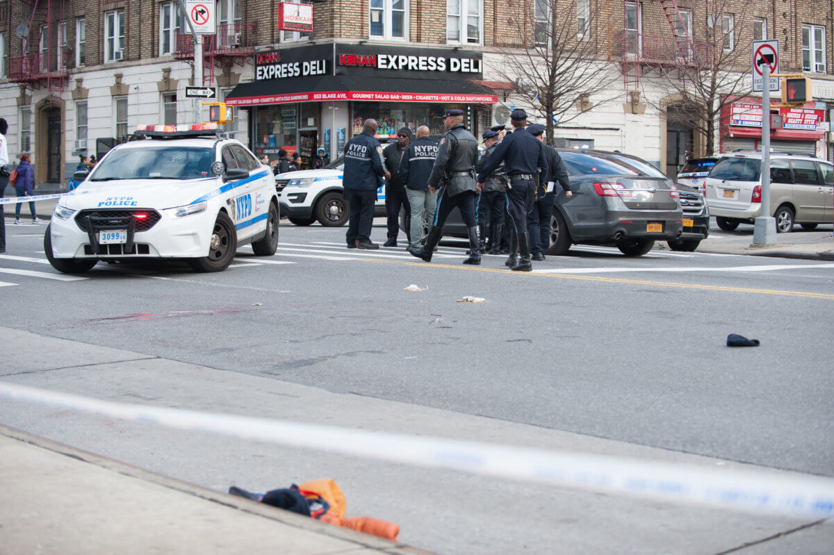 NYPD Highway Collision Unit investigates the scene of a hit and