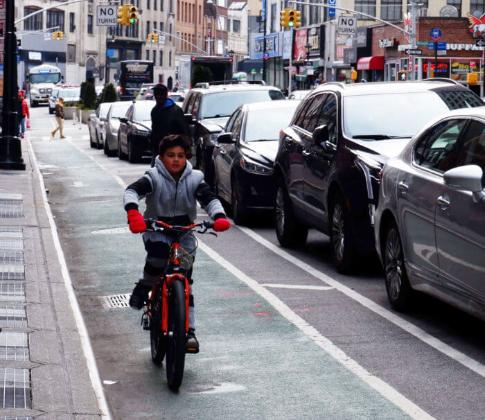 bike laneA cyclist rides through the Jay Street bike lane.