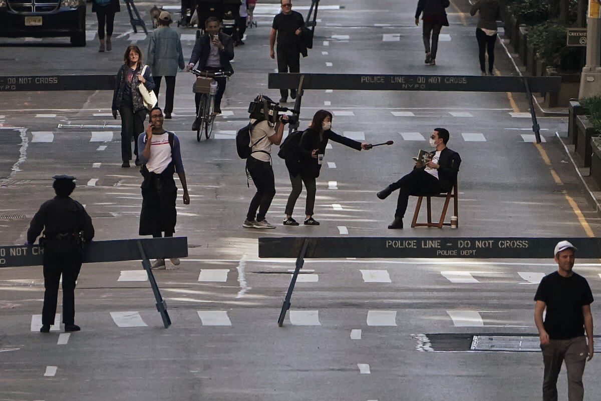 People walk on Park Avenue that was closed to vehicular traffic during the outbreak of coronavirus disease (COVID-19), in the Manhattan borough of New York City