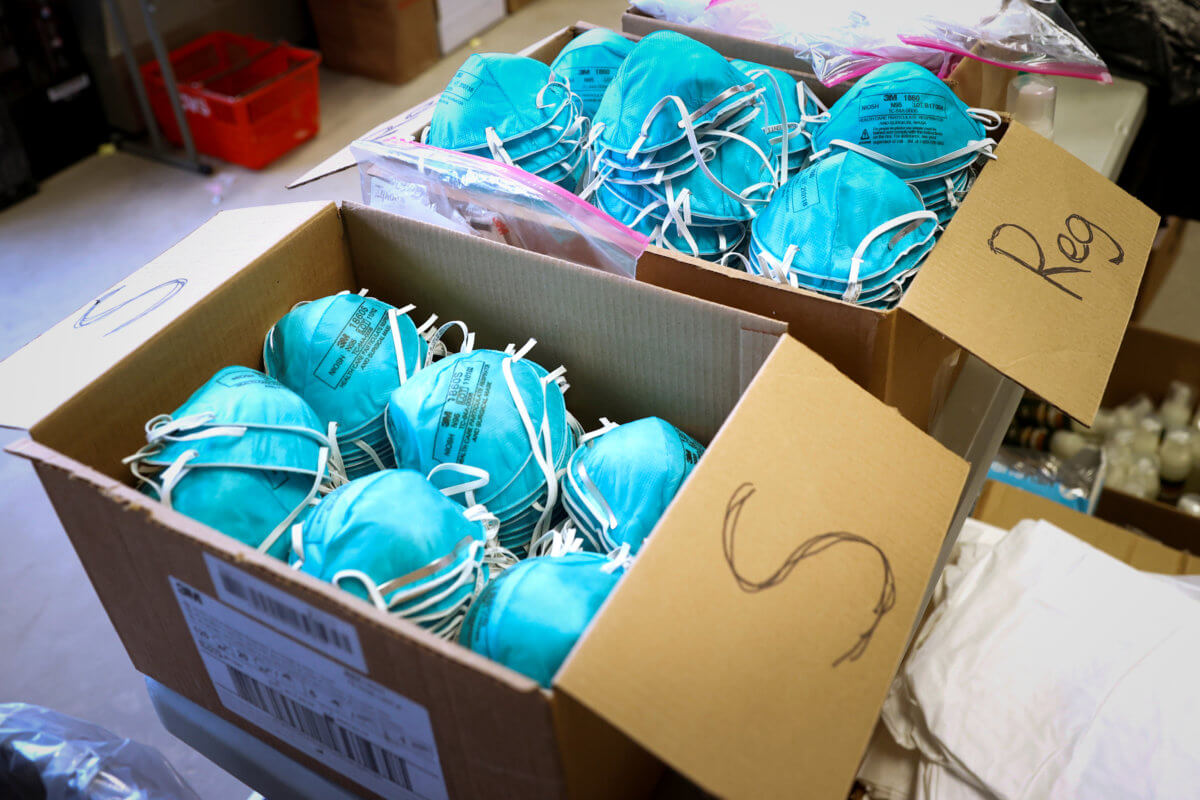 FILE PHOTO: Boxes of N95 protective masks for use by medical field personnel are seen at a New York State emergency operations incident command center during the coronavirus outbreak in New Rochelle