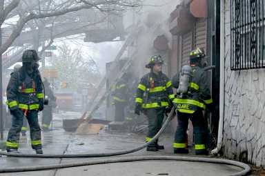 Firefighters fire at two alarm fire at 99 Schentady Avenue on Tuesday, March 31th.