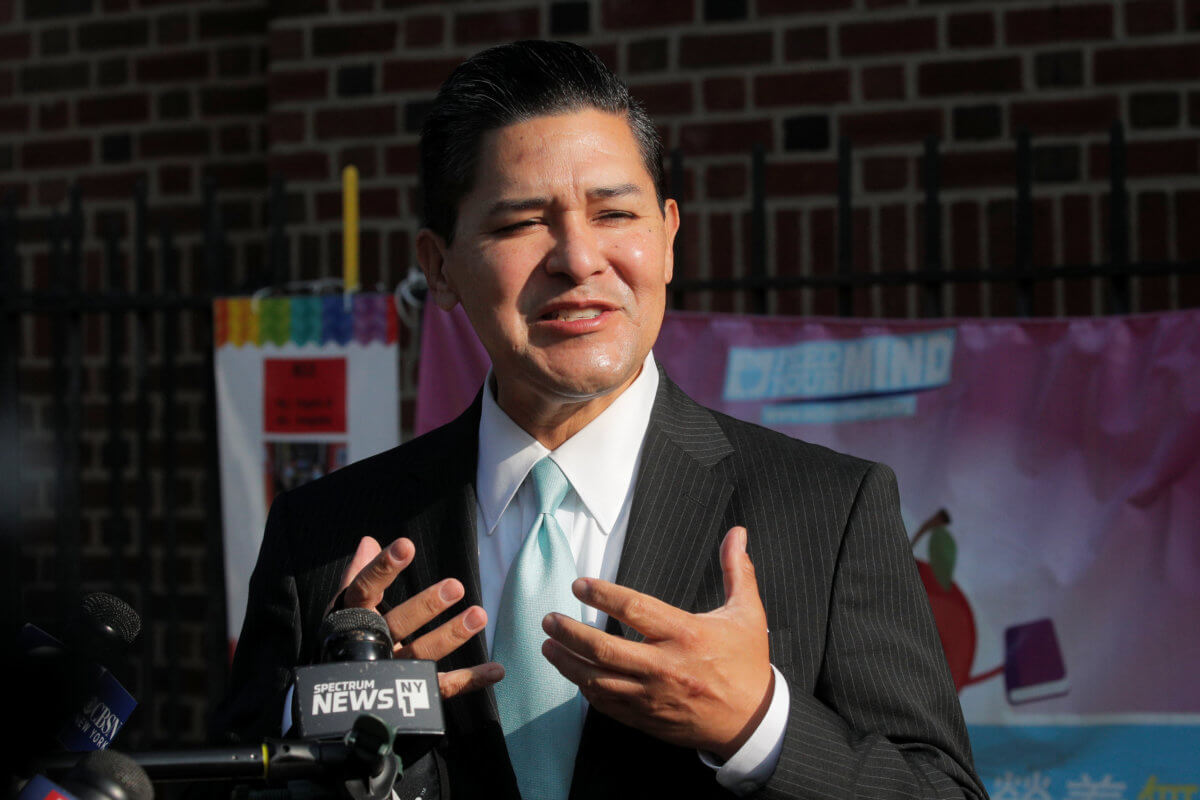 New York City Schools Chancellor Richard Carranza, speaks during a news conference after greeting students for the first day of in-person pre-school in the Queens, New York