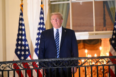 FILE PHOTO: U.S. President Donald Trump returns to the White House after being hospitalized at Walter Reed Medical Center for coronavirus disease (COVID-19), in Washington