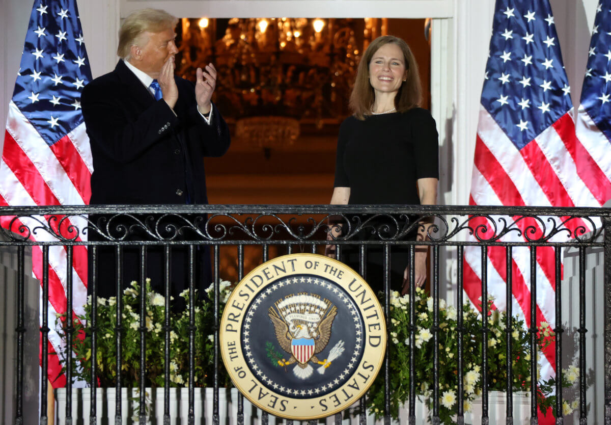 FILE PHOTO: Judge Amy Coney is sworn in as an associate justice of the U.S. Supreme Court at the White House in Washington