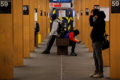 Morning commuters wait for the subway, during the outbreak of the coronavirus disease (COVID-19) in Brooklyn, New York