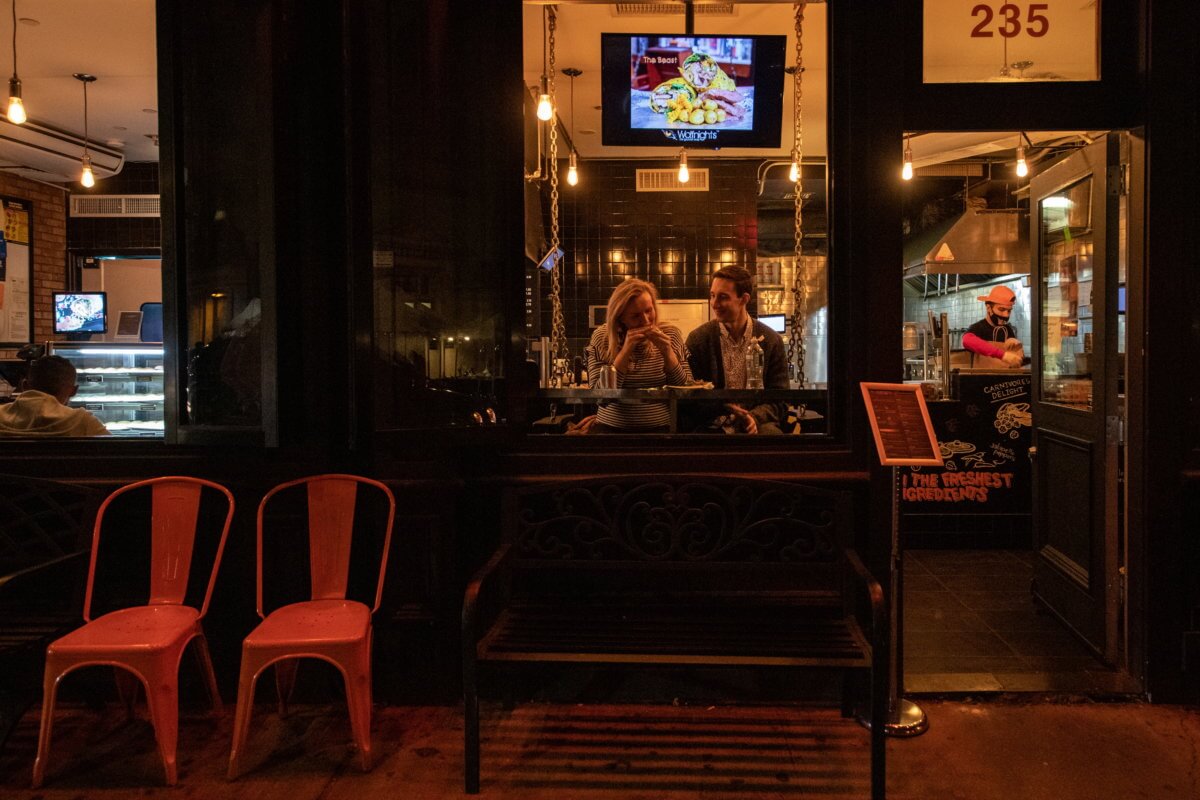 People enjoy indoor dining as the spread of the coronavirus disease (COVID-19) continues, in New York City