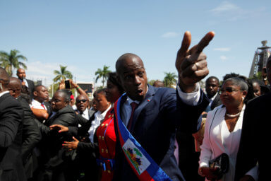 Haitian President Jovenel Moise gestures at his arrival to the National Palace during his inauguration ceremony in Port-au-Prince