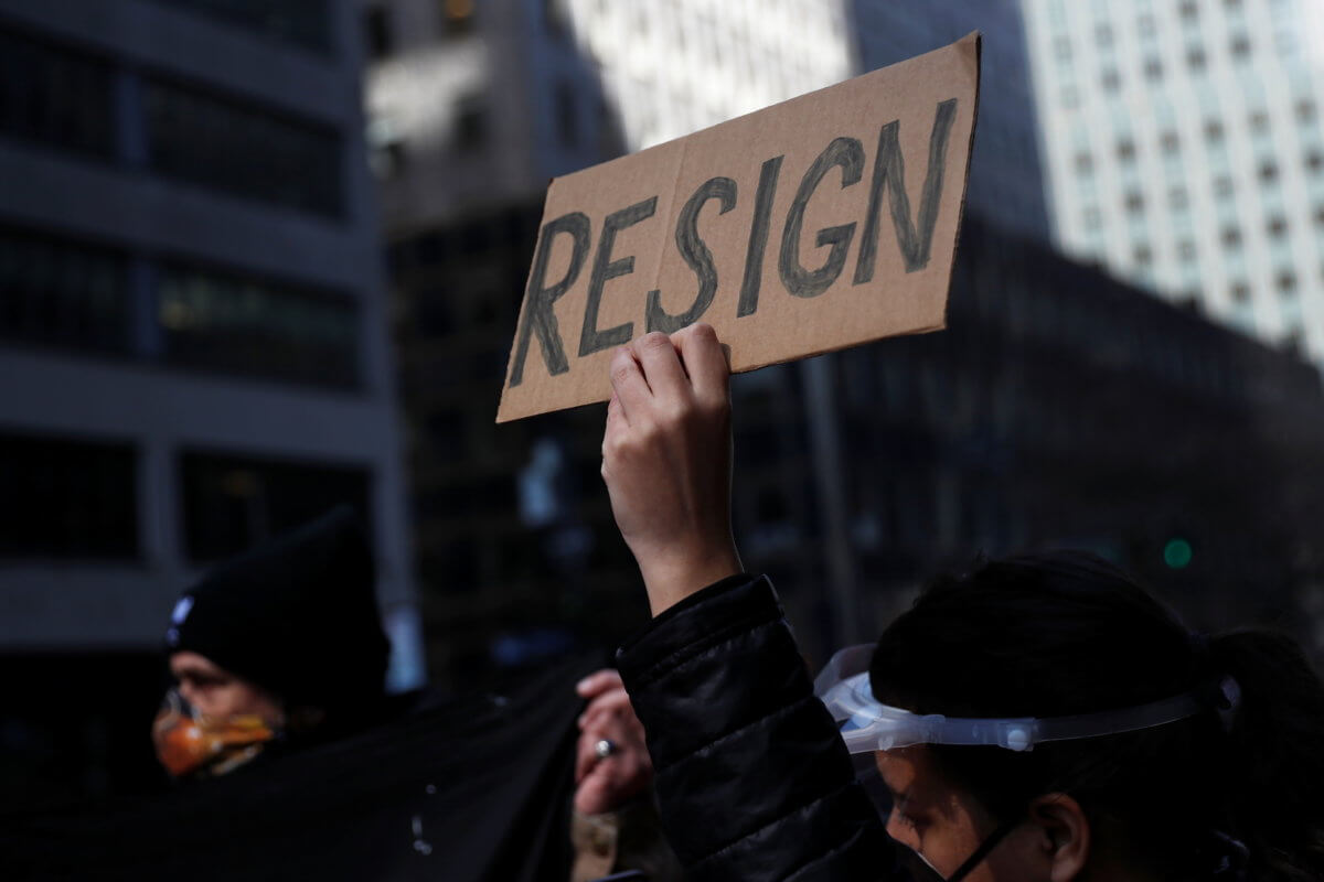 Demonstrators block 3rd avenue outside the New York Governor Andrew Cuomo’s office calling for his resignation, in the Manhattan borough of New York