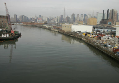 Newtown Creek flows between the boroughs of Brooklyn (L) and Queens (R) in New York, February 16, 20..