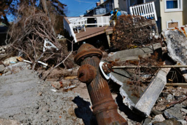 A damaged fire hydrant is seen along a Hurricane Sandy damaged waterfront in the Brooklyn borough of New York