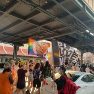 People march down Broadway protesting anti-gay attacks