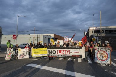 people rally outside the greenpoint energy center