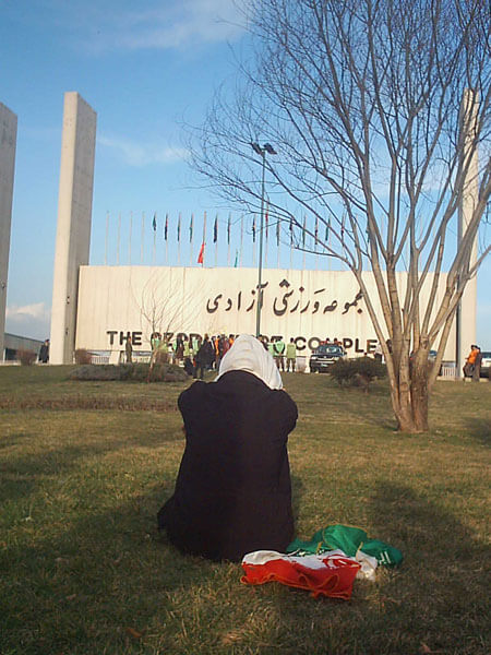 woman outside soccer stadium in Iran