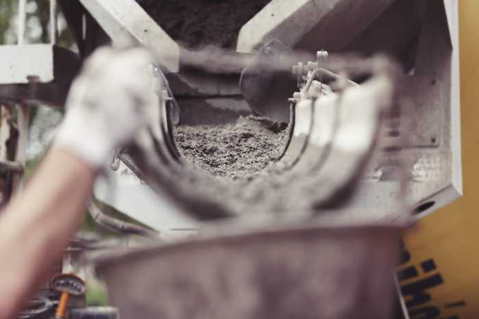 picture of cement pouring on construction site