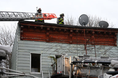 Firefighters at the scene of an all hands fire at 632 Halsey Street.