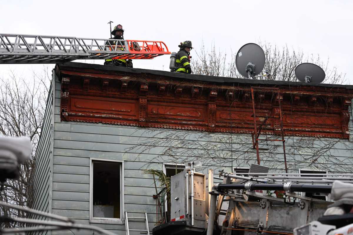 Firefighters at the scene of an all hands fire at 632 Halsey Street.