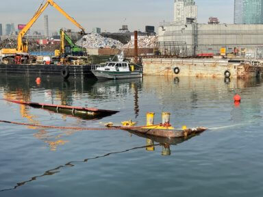 a large barge sunk in newtown creek near Greenpoint