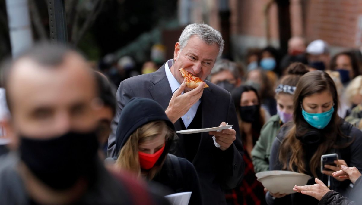 New York City Mayor Bill de Blasio stands in line to cast ballot during early voting in Brooklyn New York