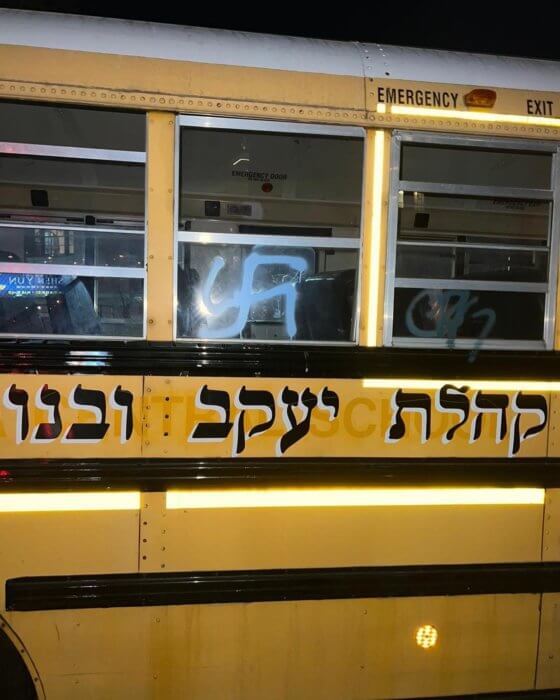 anti-semitic graffiti on a bus