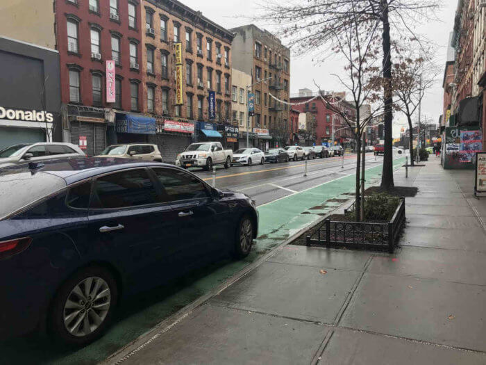 car parked grand street bike lane