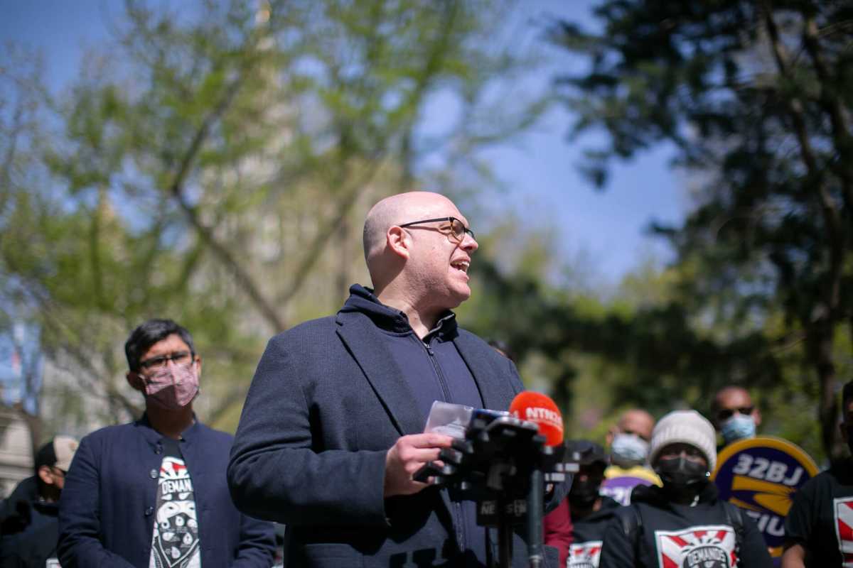 cm justin brannan at a conference. brannan hopes to bring free eye care to new york city