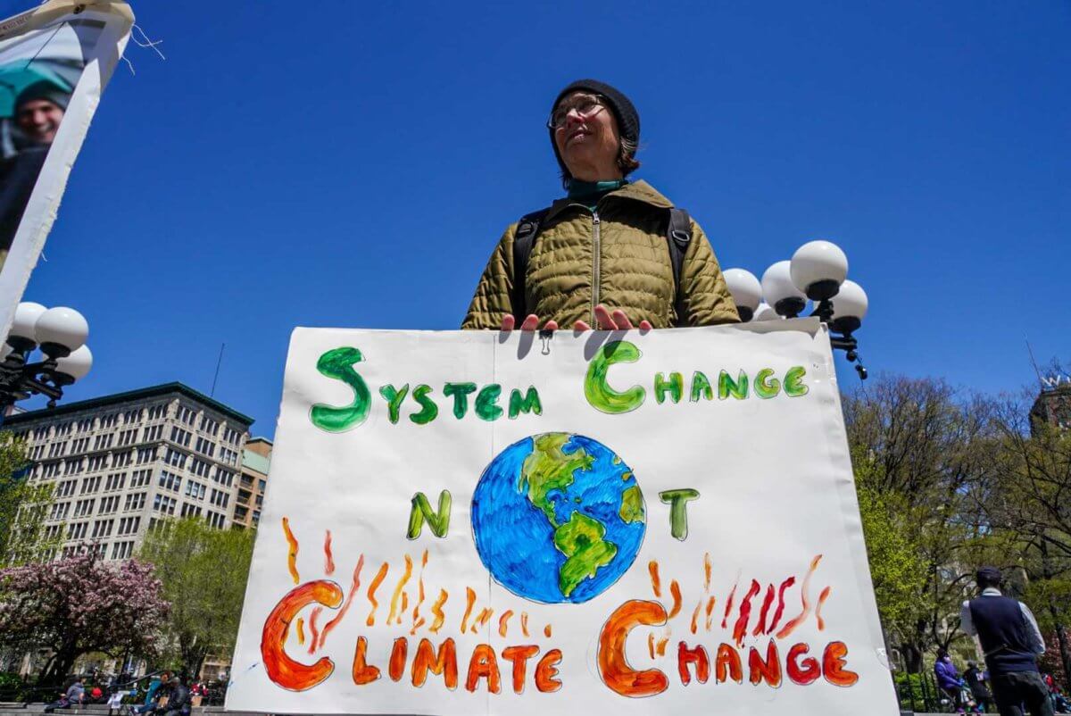 climate utilities protest sign