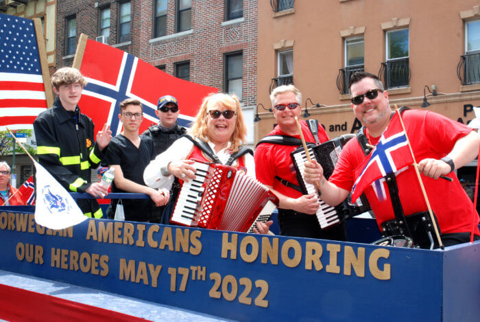 People on Norwegian Day parade float