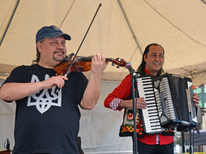 ukrainian band playing violin and accordion at bayfest