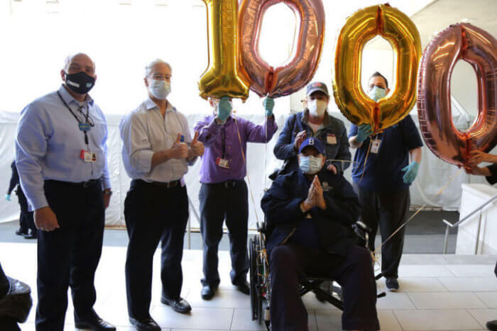 nurses at maimonides celebrate covid patient discharge