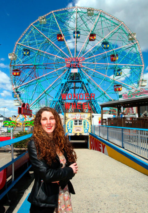 founder of parachute literary arts/coney island poetry map standing by the wonder wheel