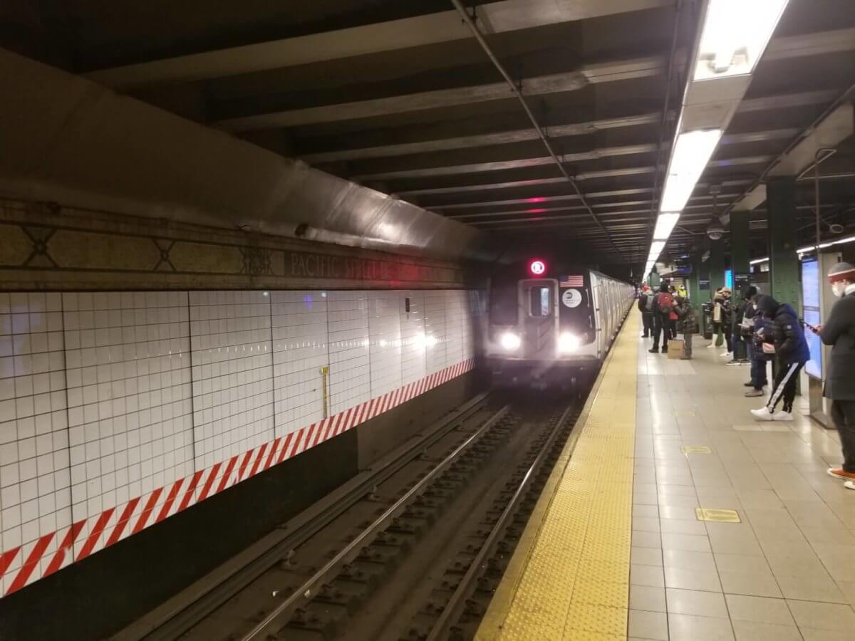 R train at platform MTA employee medical weed lawsuit
