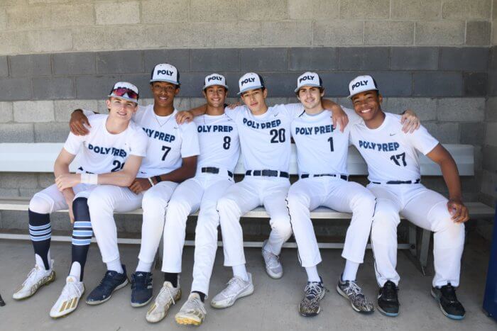 young baseball players in the poly prep dugout