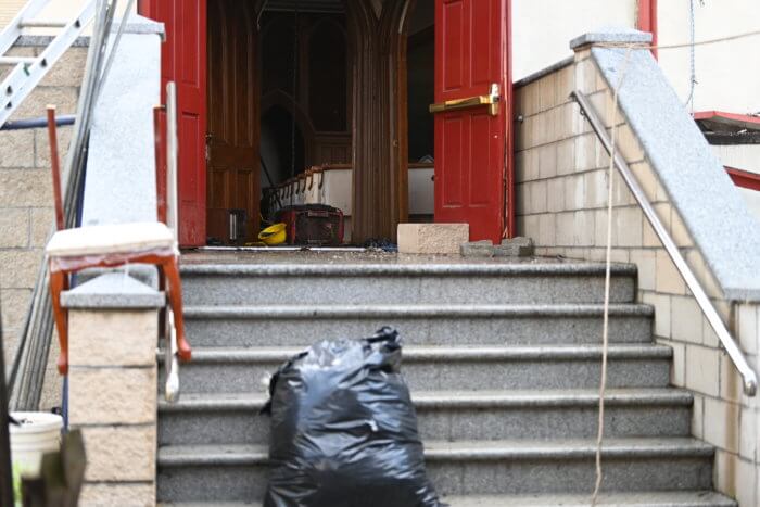 trash bag on the steps at sheepshead bay united methodist church
