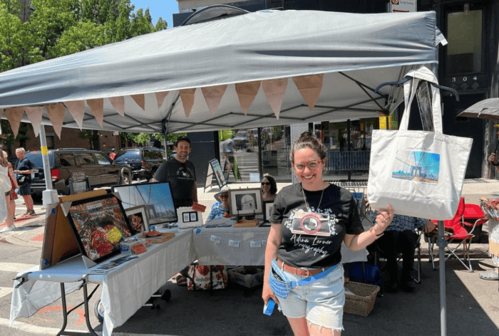 woman at booth at brooklyn pop up artisans fair at taste of park slope