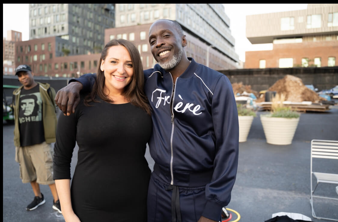 new district leader dana rachlin, woman with brown hair in all black outfit, with partner michael k williams