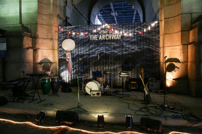 empty stage with lights and microphone at live at the archway