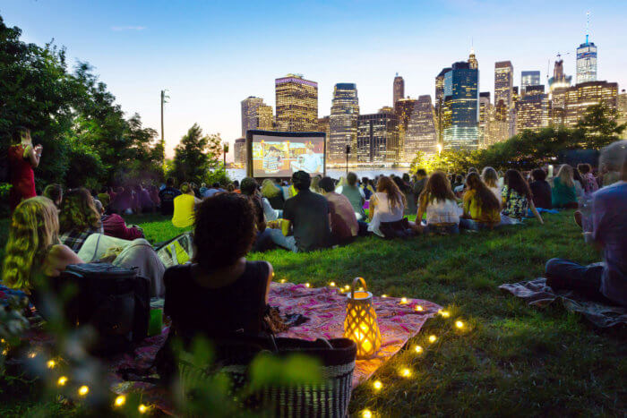 people at movies with a view in Brooklyn Bridge Park