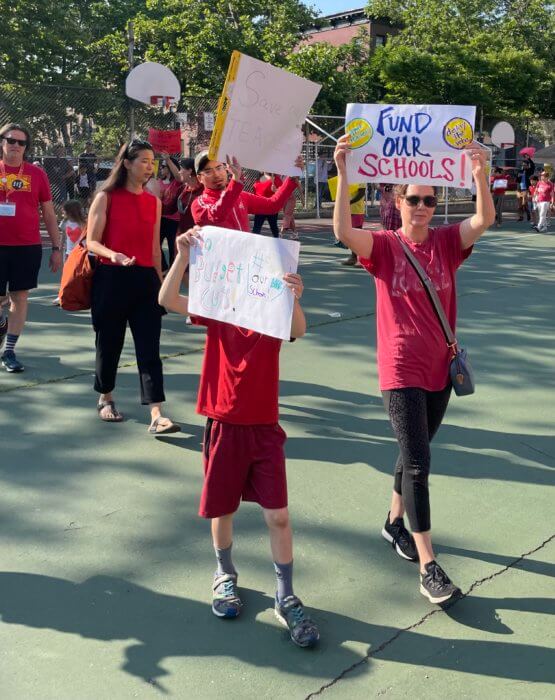 students at rally for budget cuts