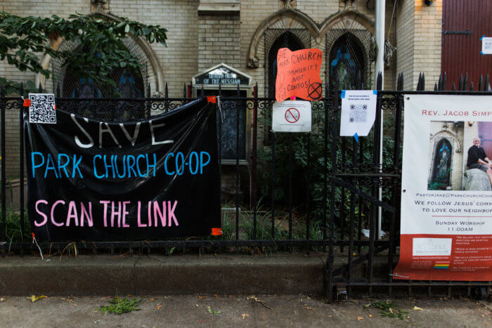 save park church coop signs on fence