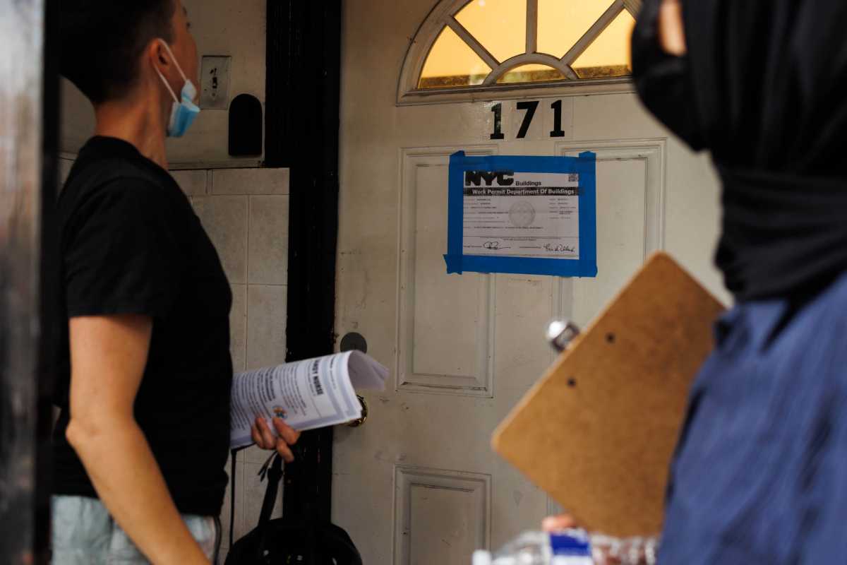 people doorknock at vacant greenbrook partners building
