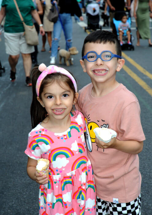 two kids eating ice cream at summer strolls on third avenue