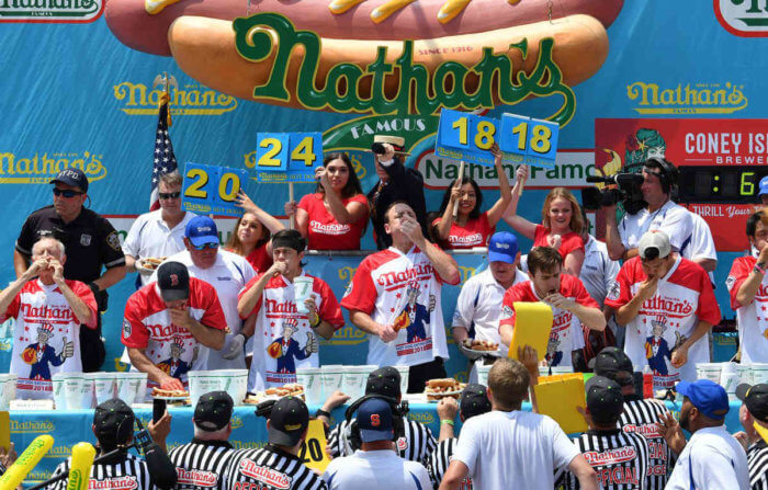 person at nathans famous hot dog eating contest